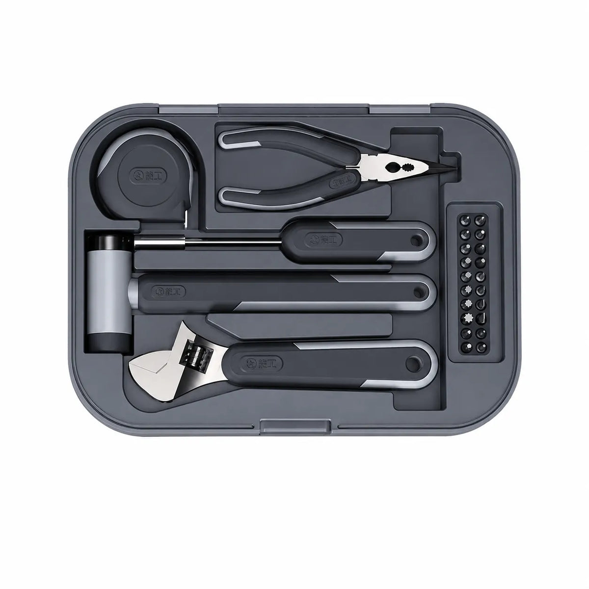 essential home tool set with adjustable wrench hammer pliers screwdriver bits and measuring tape for household repairs and DIY projects