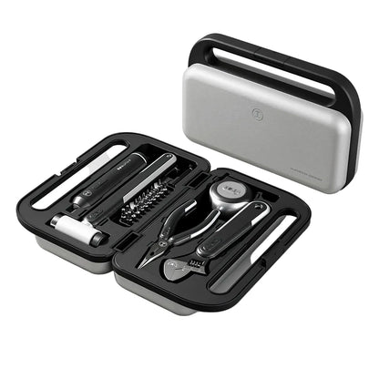 Open electric home tool kit with organized storage case, screwdriver, hammer, pliers, wrench, tape measure, and bit set