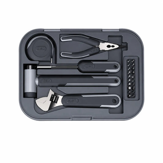 essential home tool set with adjustable wrench hammer pliers screwdriver bits and measuring tape for household repairs and DIY projects